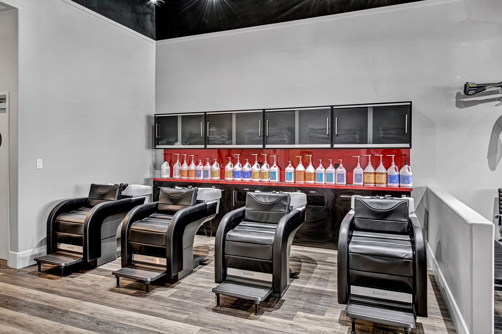Color shampoo bowls and professional product wall